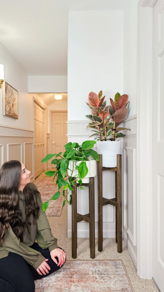 DIY Plant Stands in hallway with pole wrap trim and box detail