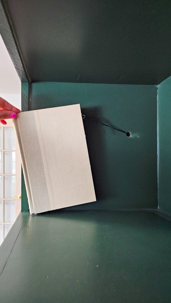 opening book lever sitting on shelf